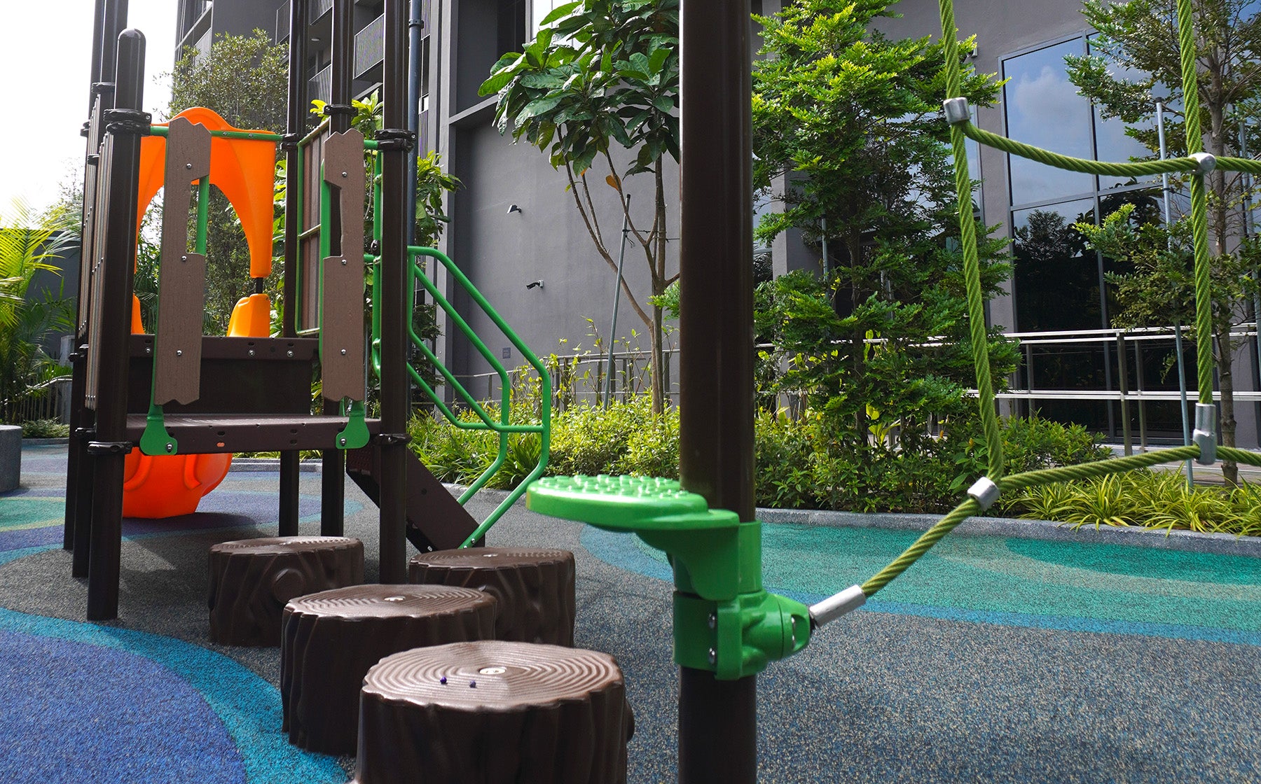 Playworld rope play structure with tree stump stepping pods encourages balance, climbing and coordination skills.