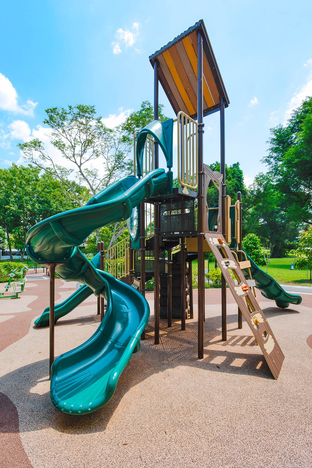 Meng Suan Interim Park features a nature-inspired Playworld playground, blending seamlessly with lush surroundings.