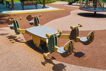 Meng Suan Interim Park's four-seater seesaw promotes teamwork and social interaction, providing fun for children.