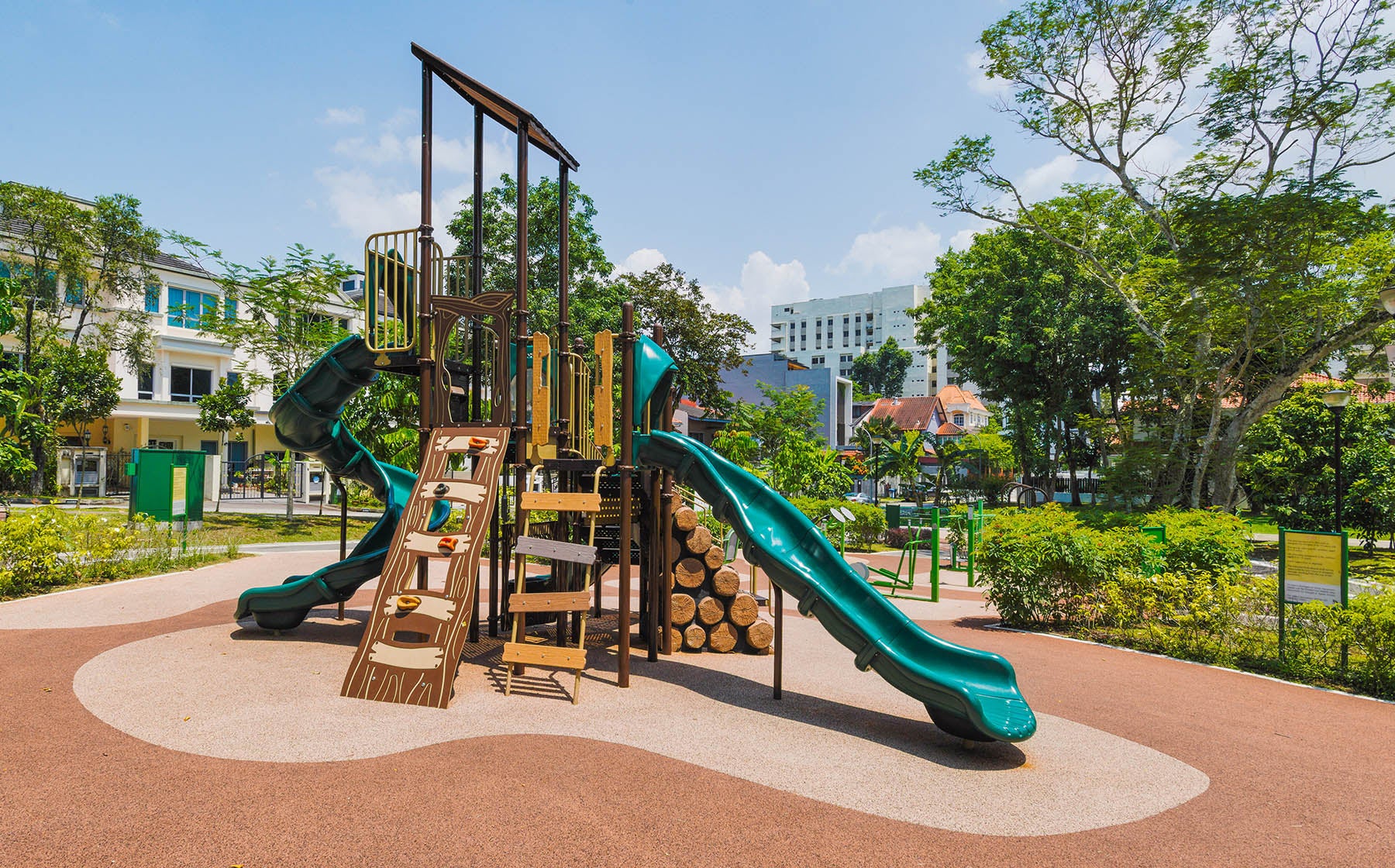 Meng Suan Interim Park features a nature-inspired Playworld playground, blending seamlessly with lush surroundings.