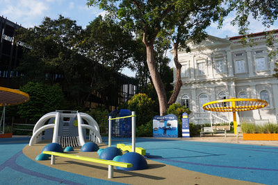 A Whale of a Tale playground at the National Museum of Singapore features play mounds and a balance beam for agility.