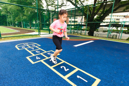 Playground EPDM surface with hopscotch layout, promoting active play and safety for children in the playground.