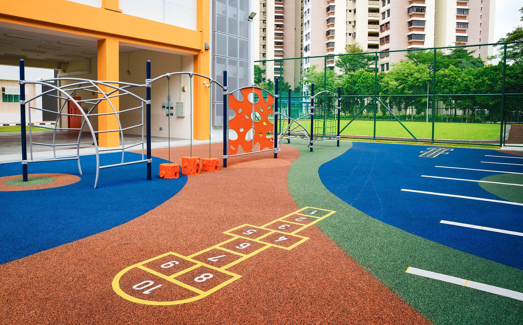 Playground EPDM surface with hopscotch layout, promoting active play and safety for children in the playground.