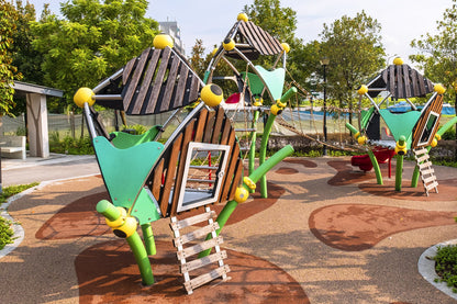 Nim Meadow Park Berliner playground with Greenville structures, rope nets, ladder, and suspension bridge for adventure.