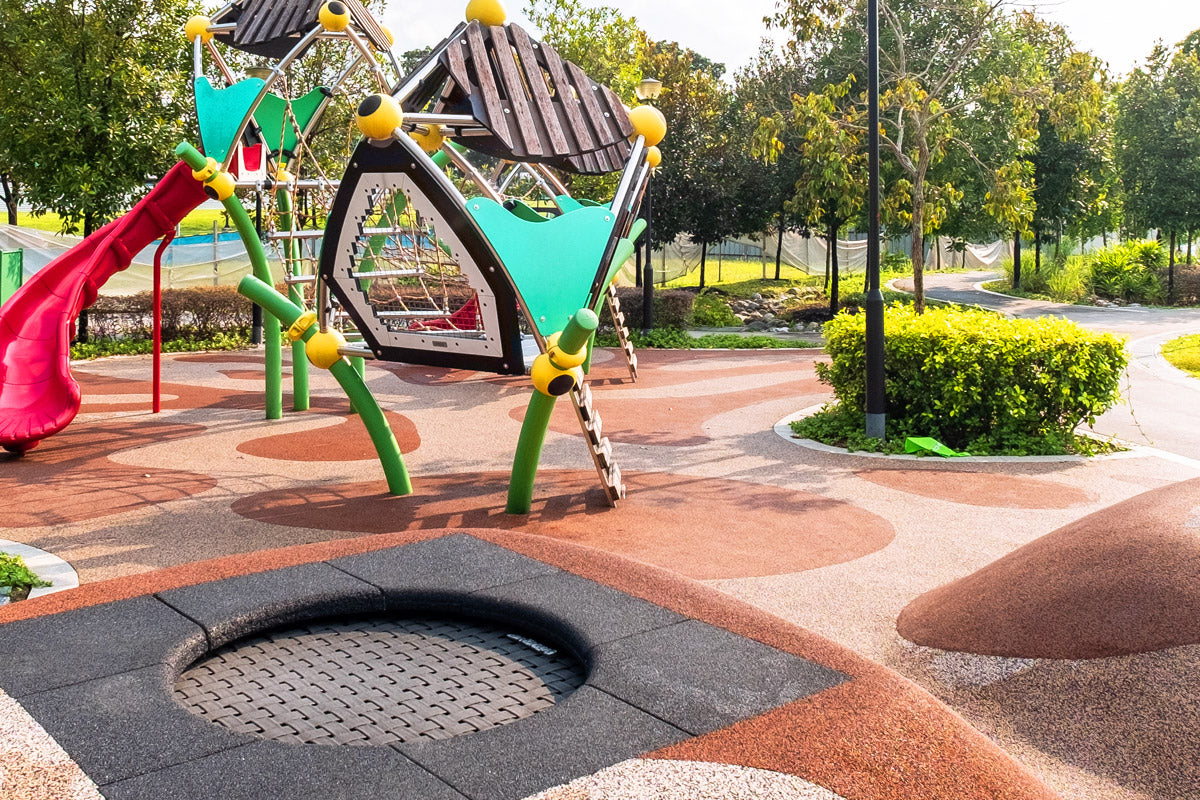 Nim Meadow Park playground trampoline is durable and designed to promote active play and physical fitness for children.