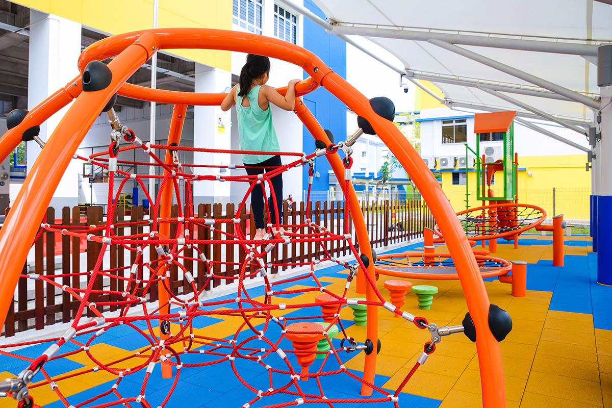 Playworld Unity Web, a compact climbing structure offering inclusive fun for children of all abilities.