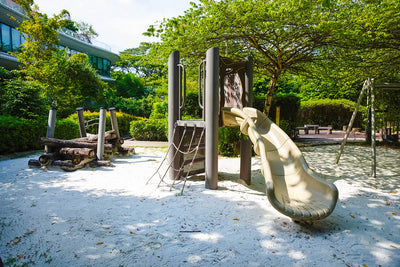 Wobble Bridge challenges children's balance skills, complemented by a playground set with a rope climb and slide.