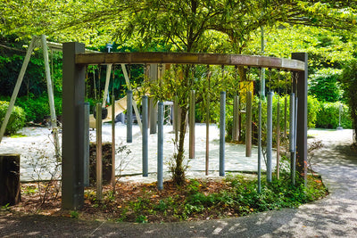 Percussion Play Bamboo Chimes, allowing children to create melodies and engage in musical exploration during play.