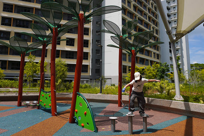 Sensory play panels and low tightrope bridge supporting balance play and tactile early development activities.
