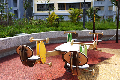 Playworld four-person see-saw promotes teamwork, social interaction and motor skill development through play.