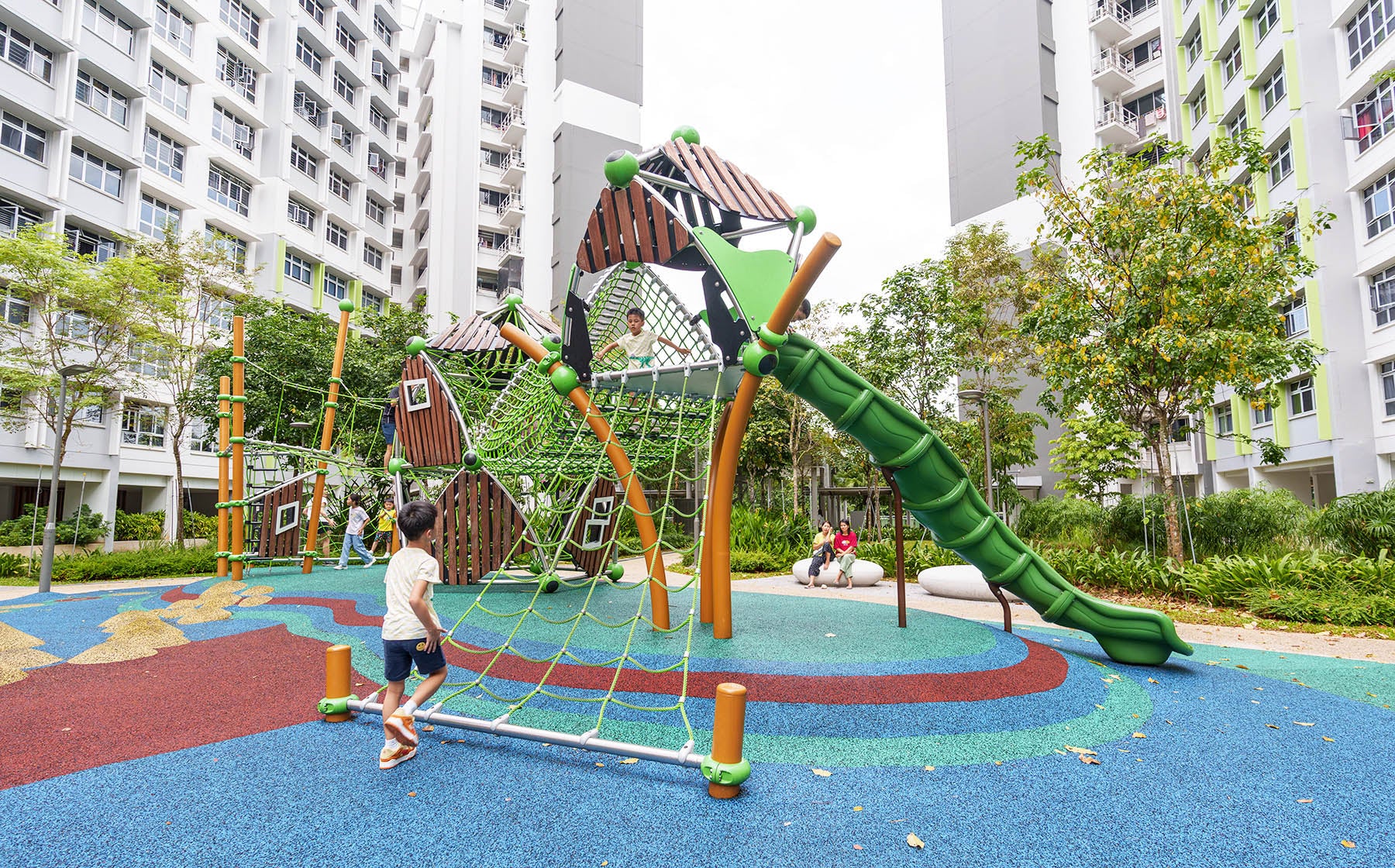 Berliner Tower playground at Yishun Melody Spring with climbing, balancing, and rope ladder challenges for active play.