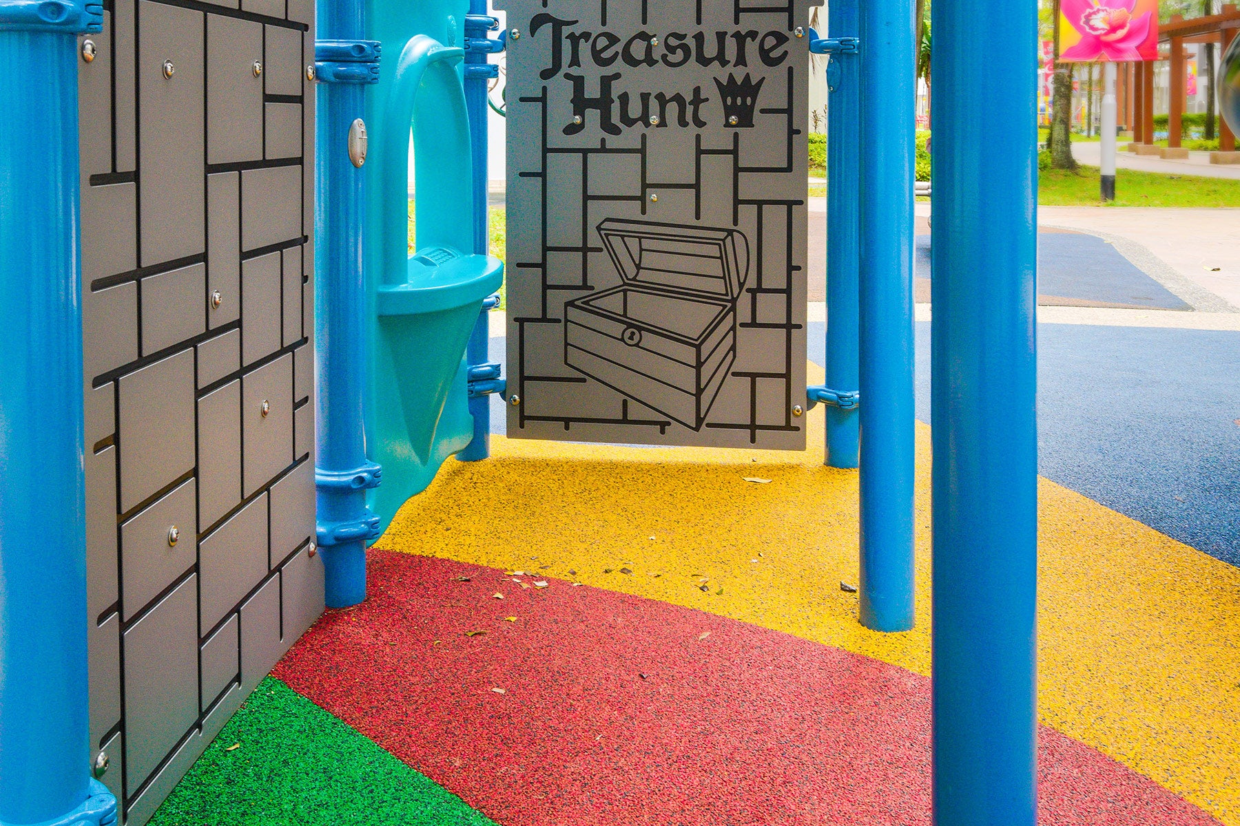 Playworld play panel featuring a treasure chest, sparking children's imagination with a dragon's treasure bounty.