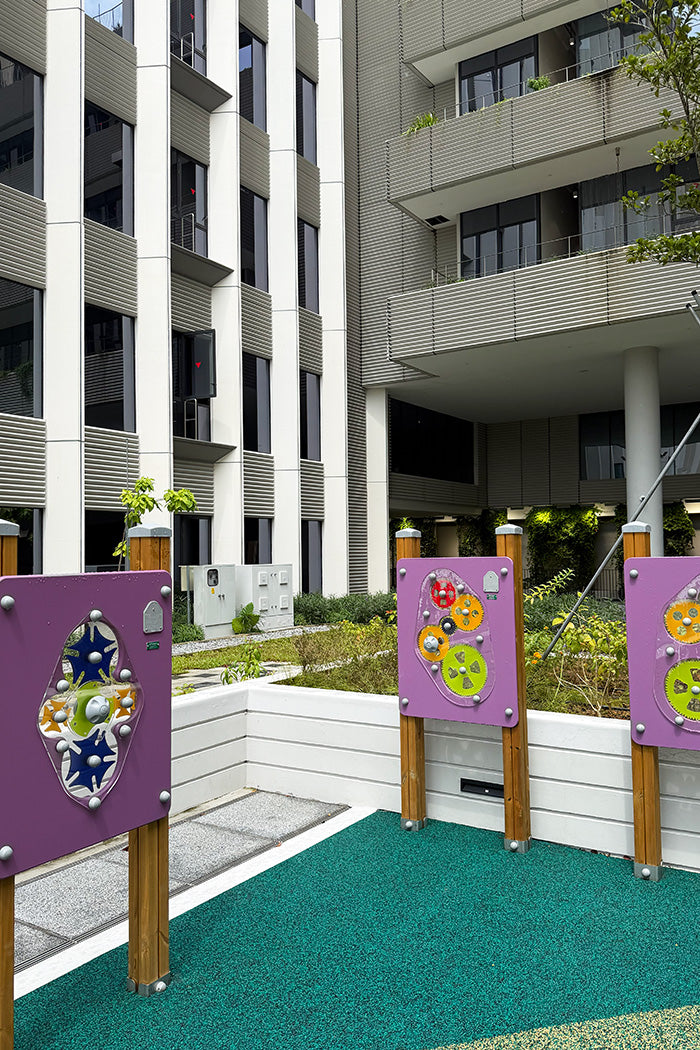 Punggol Digital District playground features gear play panels that teach force transmission and change of direction.
