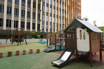 Punggol Digital District playground features a hut with imaginative play furniture, inspiring creative role-playing fun.