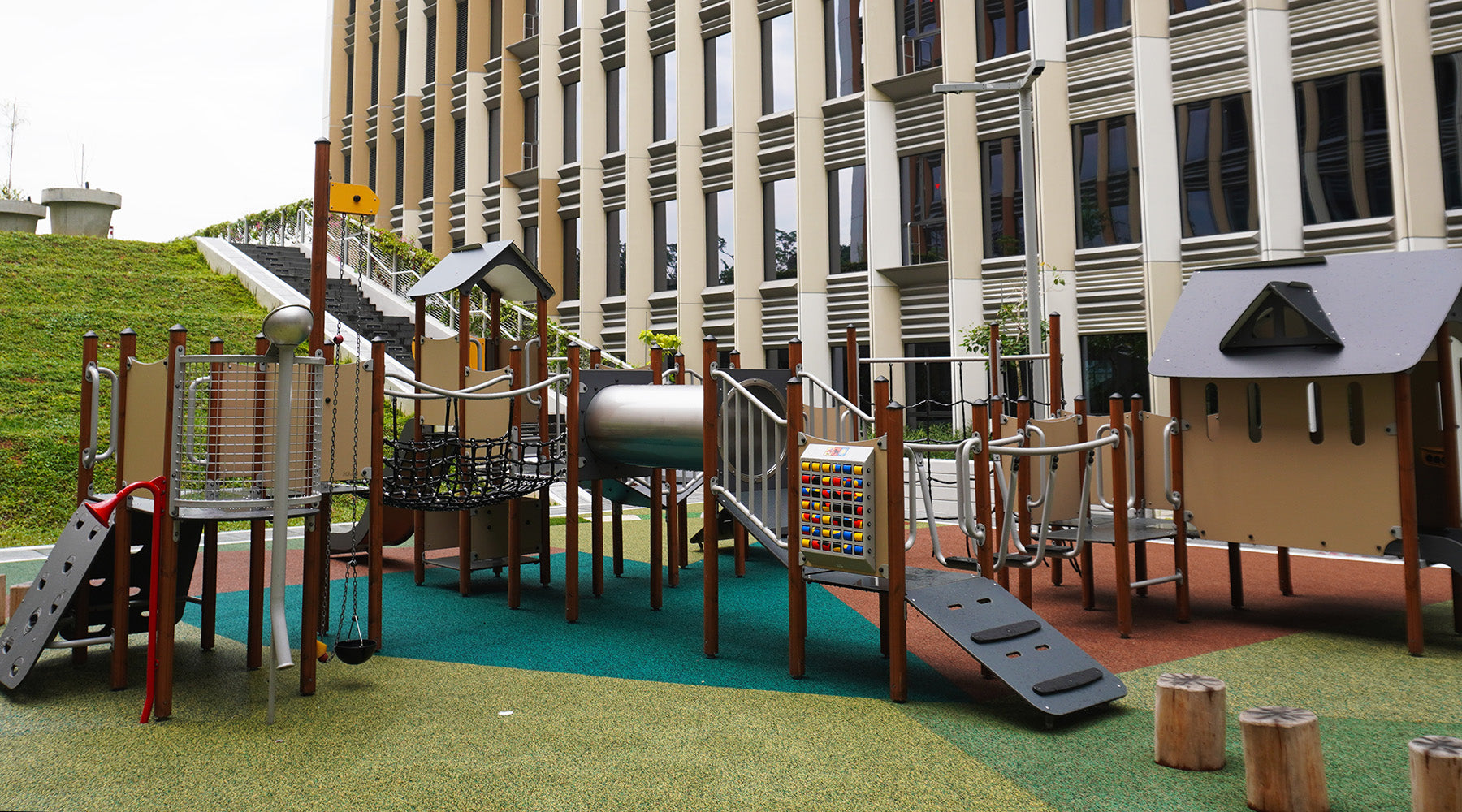 Punggol Digital District playground features slides, rope bridges, steppers, and science-inspired play for active fun.