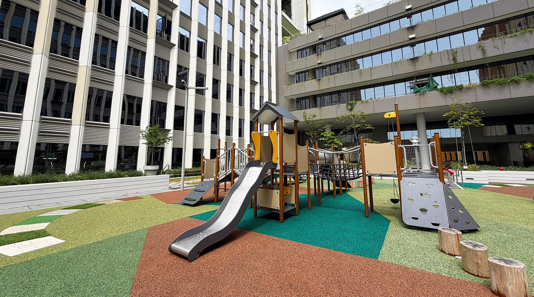 Punggol Digital District playground features slides, rope bridges, steppers, and science-inspired play for active fun.