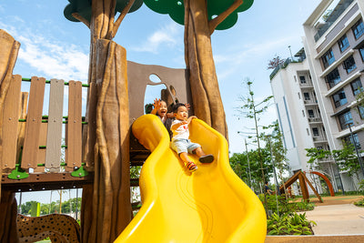 Punggol Point Crown animal-themed playground for 2-5-year-olds featuring a safe yellow slide for fun play.