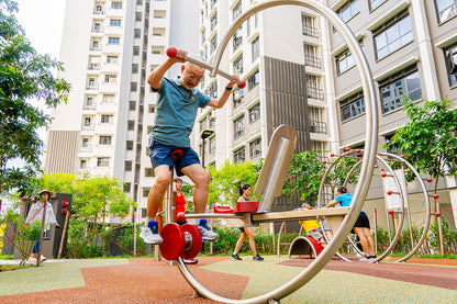 Elderly individuals using exercise equipment at an outdoor fitness corner, promoting active lifestyles in a safe environment.