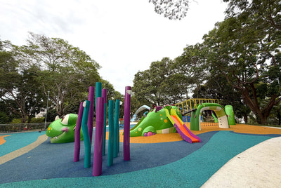 A cluster of vertical poles designed to look like sea anemones is beside the Sea Dragon playground at Sea Shell Park.