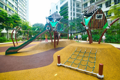 Children play in a Berliner playground, enjoying activities like climbing, sliding, and swinging in a vibrant setting.