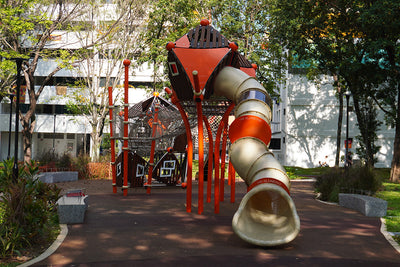 Berliner Greenville treehouse with spiral slide encourages climbing, sliding and active outdoor play all day.