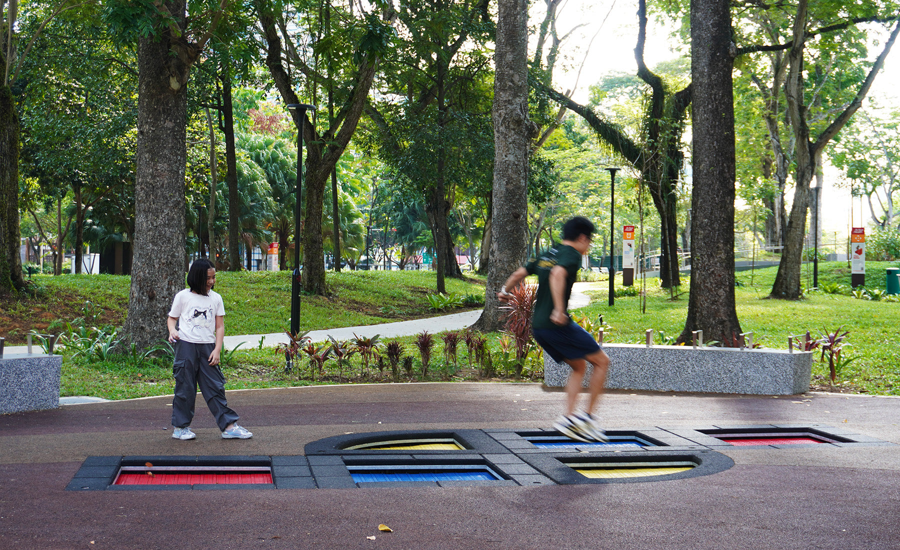 Interplay in-ground trampolines provide durable bouncing play with flush surfaces for easy bouncing movement access.