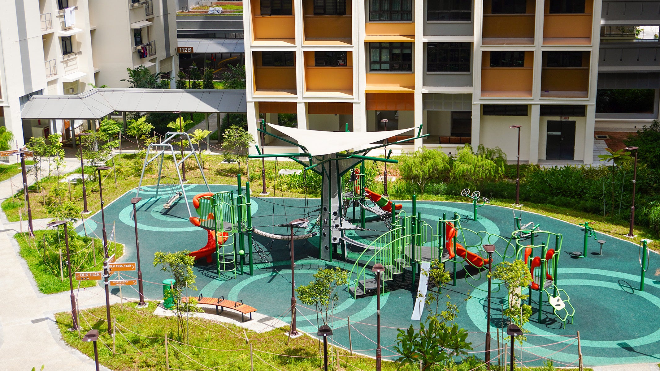 Tengah Plantation Acres playground with diverse play and fitness equipment, promoting active lifestyles and family time.