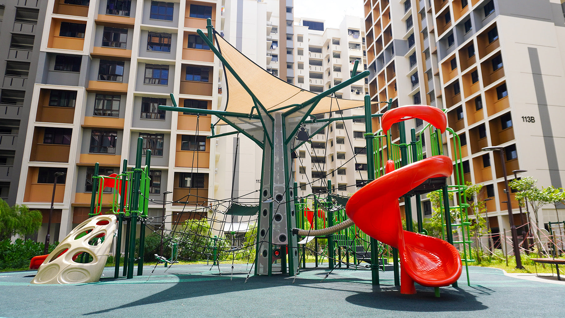 Tengah Plantation Acres playground with diverse play and fitness equipment, promoting active lifestyles and family time.