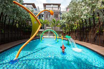 Vortex Internation water playground features elements that create a misty water effect, encouraging various types of gameplay for children.