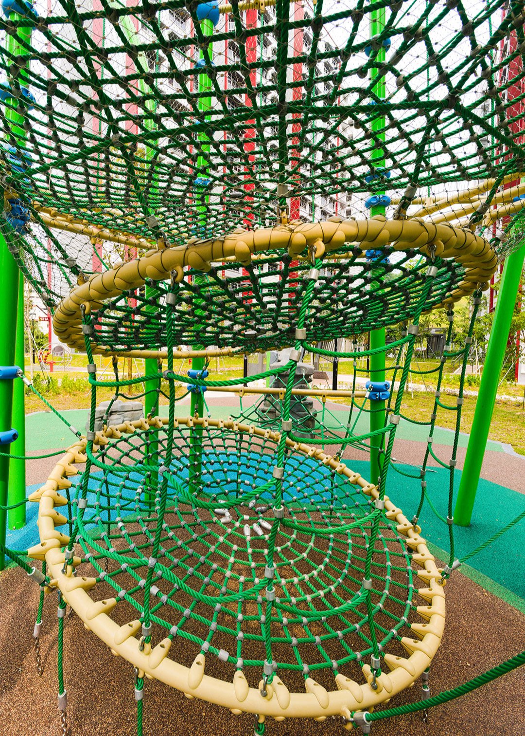 A Berliner playground with multiple climbing structures, offering children an adventurous space to play and explore.