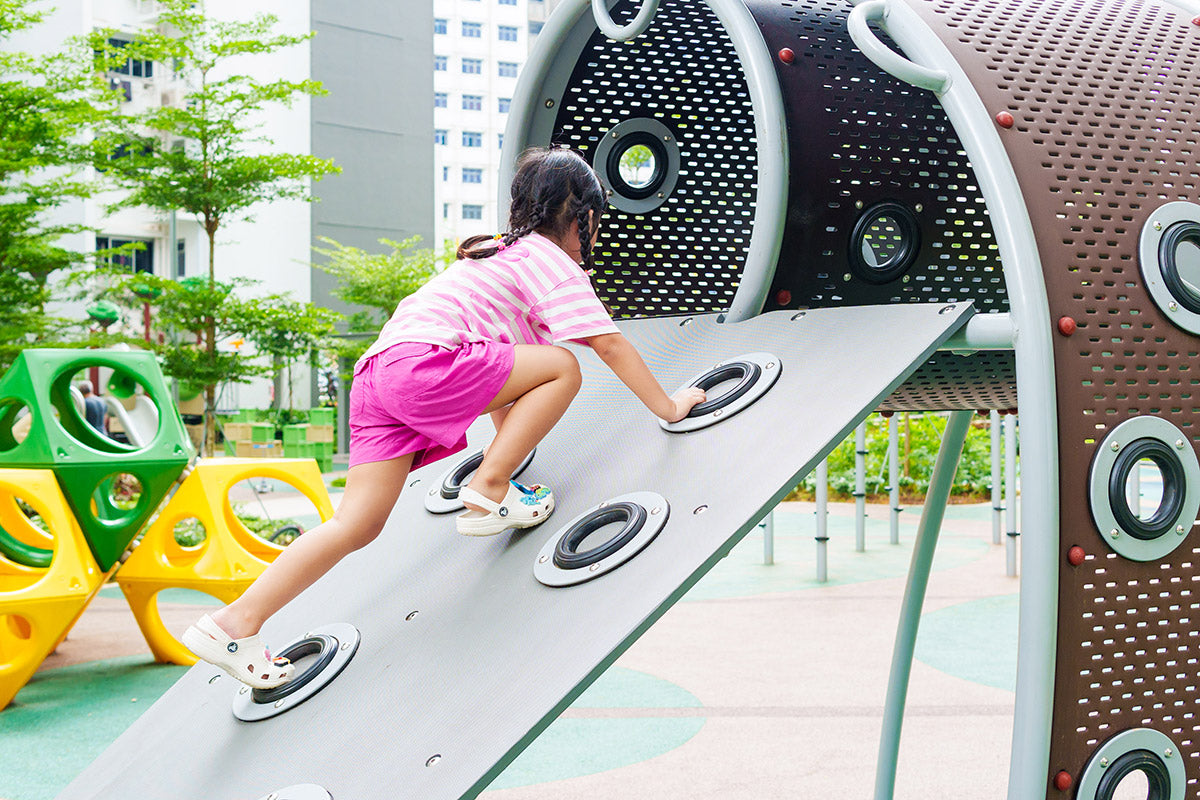 Yishun Glen playground for ages 2-5 with equipment designed to enhance mobility through climbing and crawling.